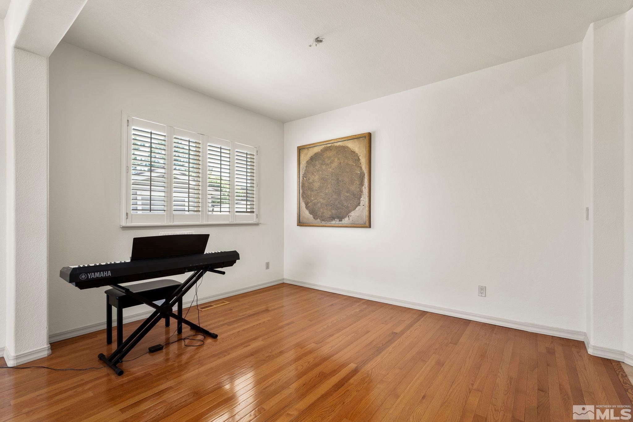 50 Deer Valley Court Reno, NV 89511 - Photo 10 of 39 a living room with furniture and a window