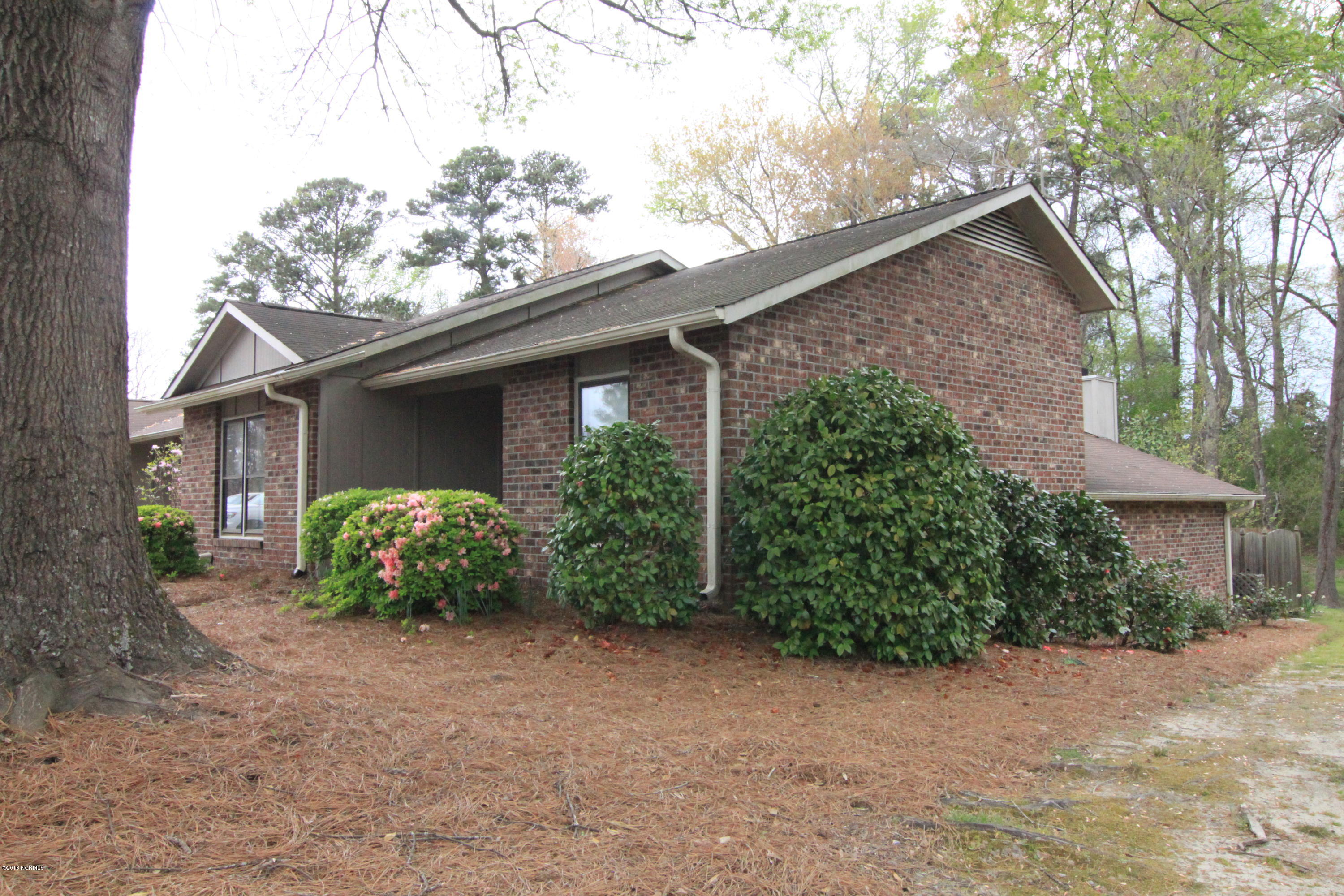 1929 Quail Ridge Road, Unit F Greenville, NC 27858 - Photo 2 of 2 End Unit home in Quail Ridge enjoys private backyard