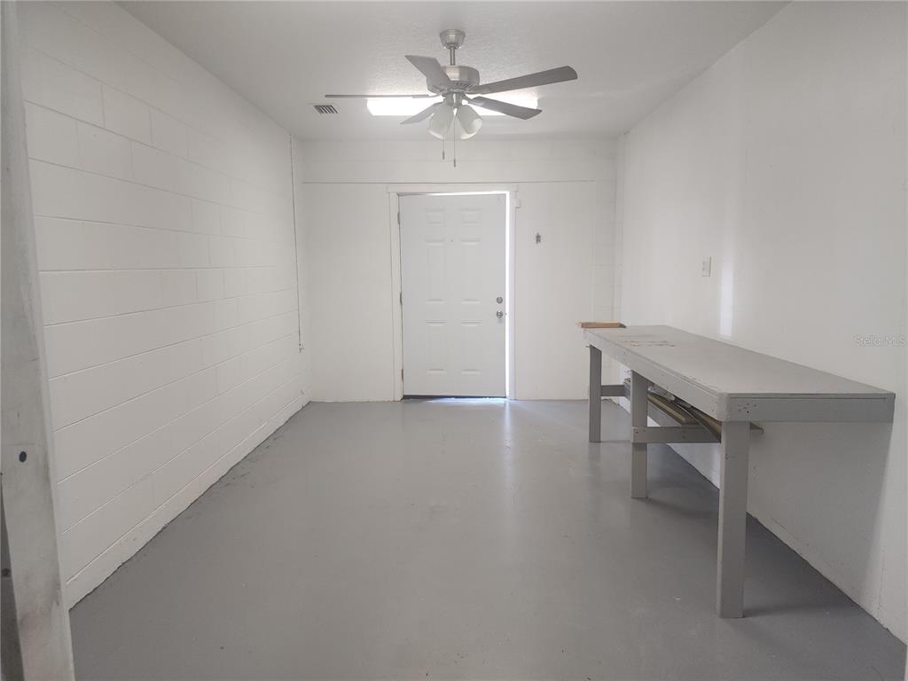 63 Estrella Road DeBary, FL 32713 - Photo 14 of 50 a view of an empty room with a ceiling fan