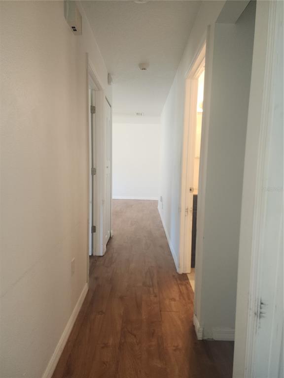 63 Estrella Road DeBary, FL 32713 - Photo 17 of 50 a view of a room with wooden floor and a window