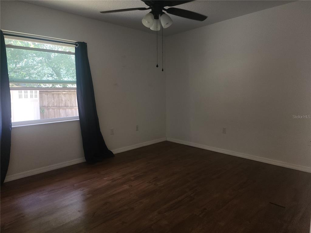 63 Estrella Road DeBary, FL 32713 - Photo 21 of 50 a view of an empty room with a window