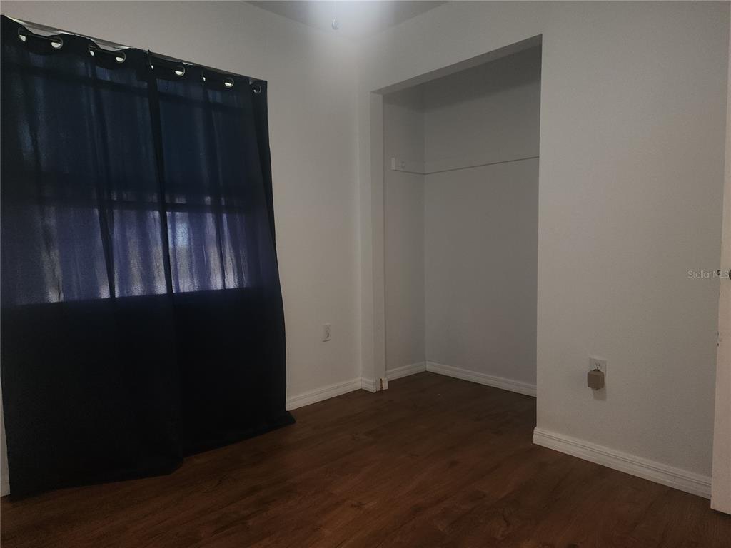 63 Estrella Road DeBary, FL 32713 - Photo 25 of 50 an empty room with wooden floor