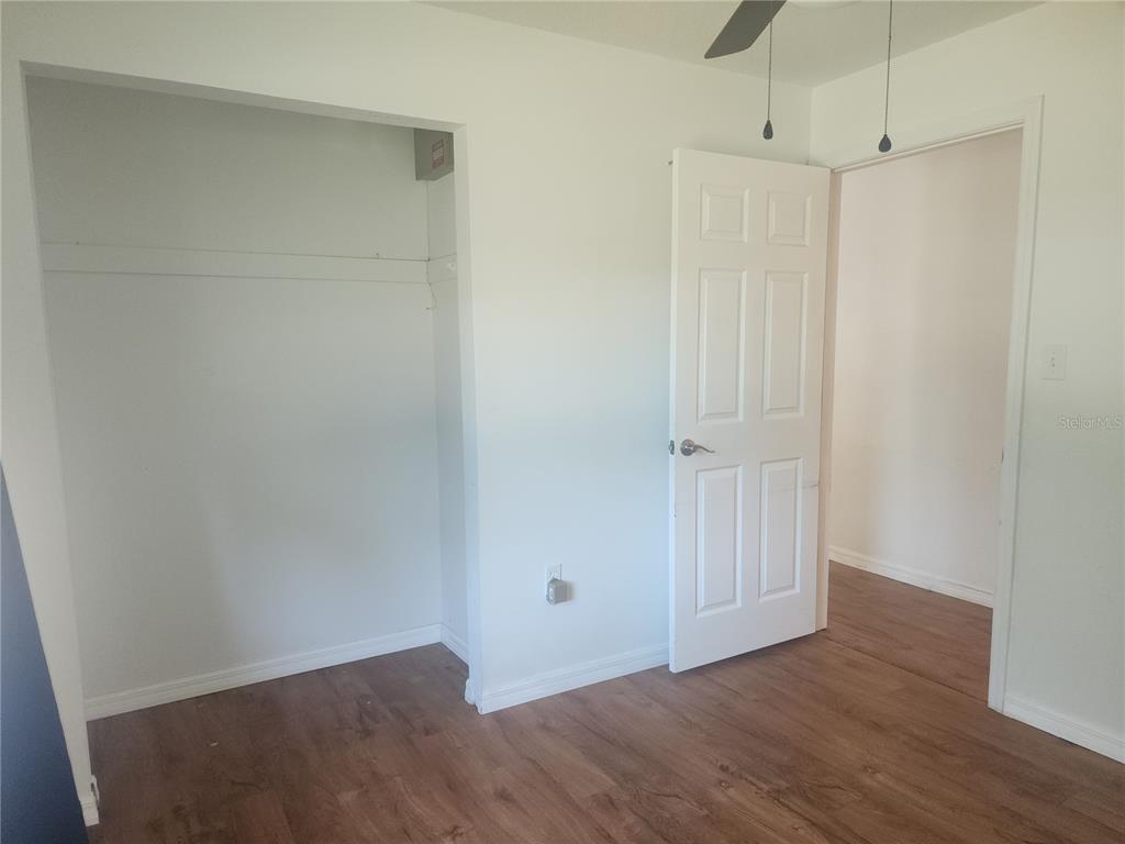 63 Estrella Road DeBary, FL 32713 - Photo 30 of 52 a view of an empty room with wooden floor