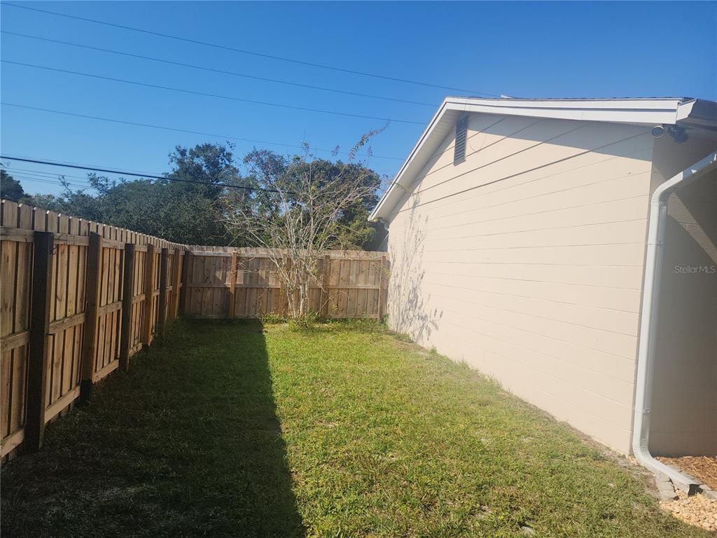 63 Estrella Road DeBary, FL 32713 - Photo 44 of 52 a view of a back yard of the house