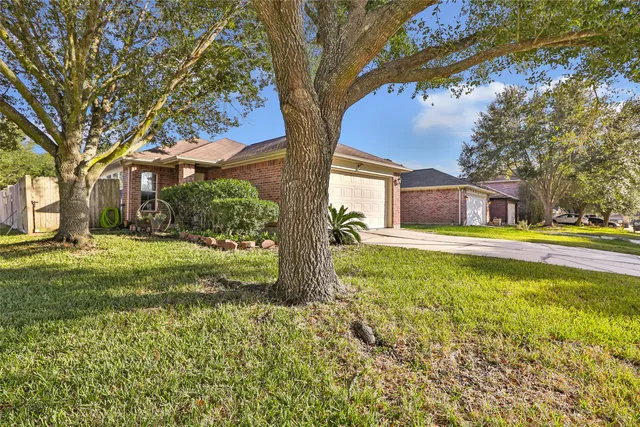 a house view with a garden space