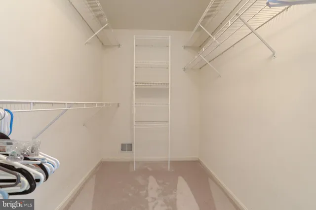 a view of a room with rack on the wall