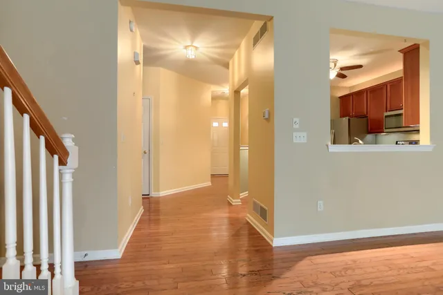 a view of a bathroom from a hallway