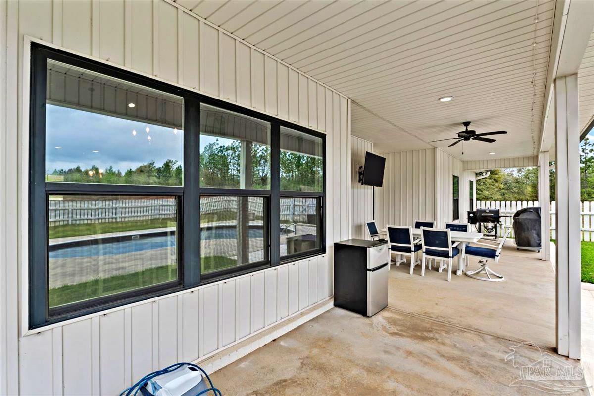 7400 Tidwell Road Pace, FL 32571 - Photo 33 of 36 a living room with furniture