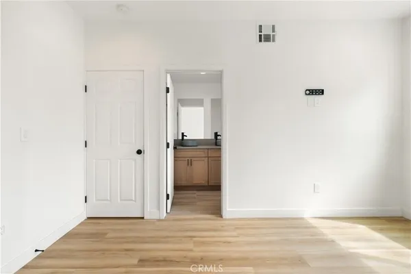 a bathroom with a shower and a toilet