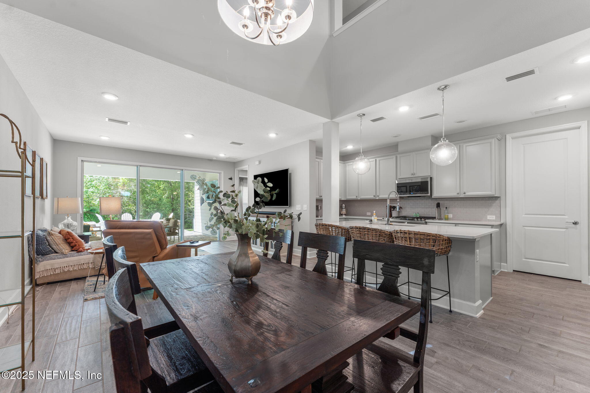 267 Windswept Way St. Augustine, FL 32092 - Photo 12 of 50 a view of a dining room with furniture window and wooden floor