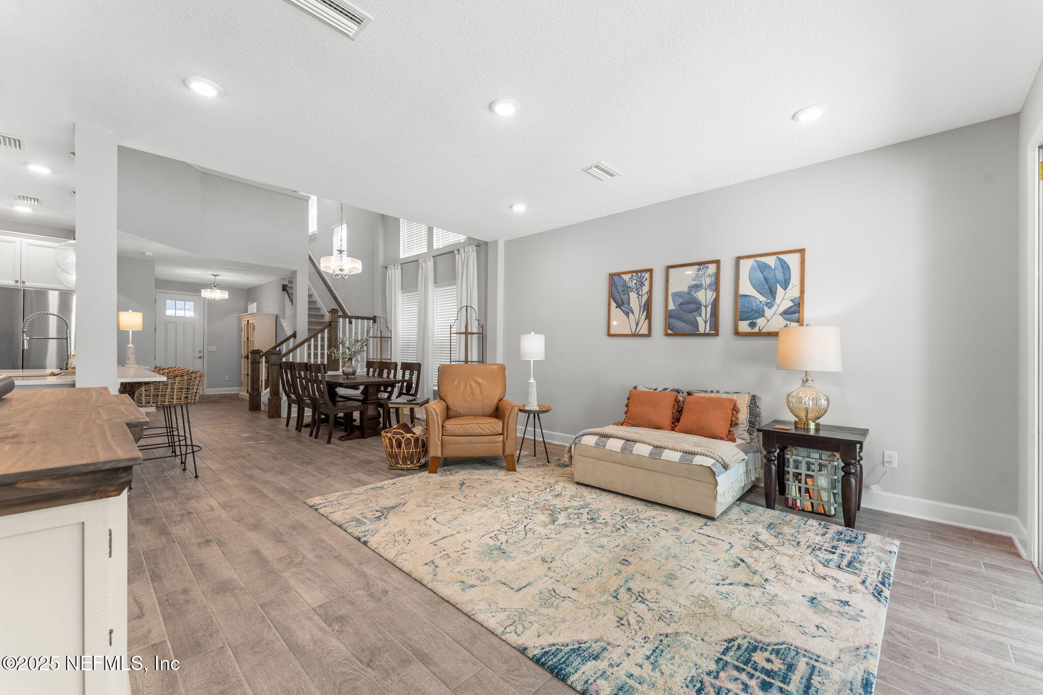 267 Windswept Way St. Augustine, FL 32092 - Photo 17 of 50 a living room with furniture and a wooden floor