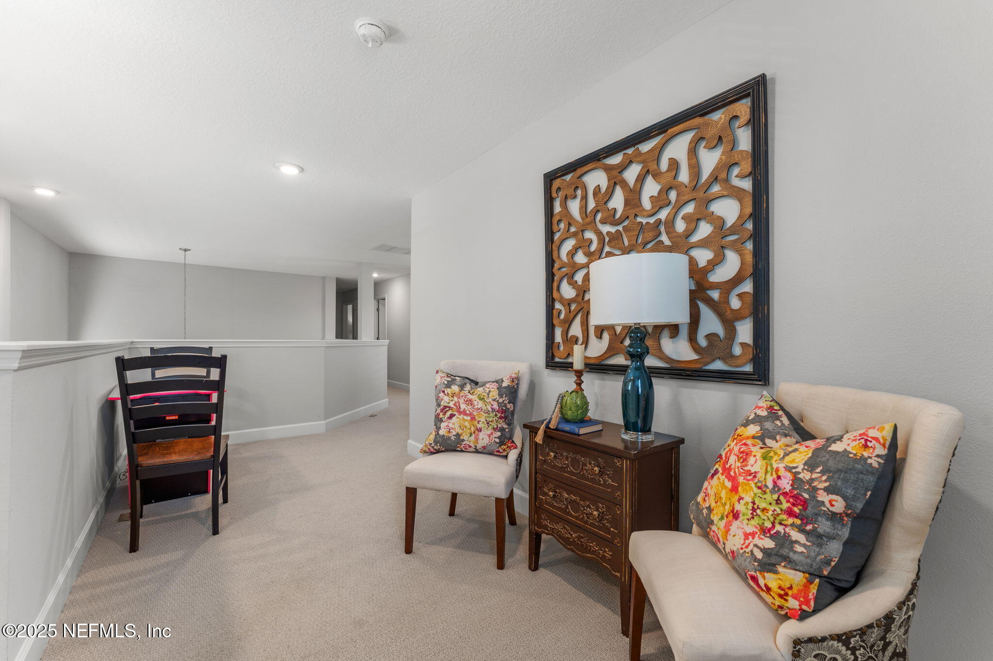 267 Windswept Way St. Augustine, FL 32092 - Photo 24 of 50 a living room with furniture a rug and a painting
