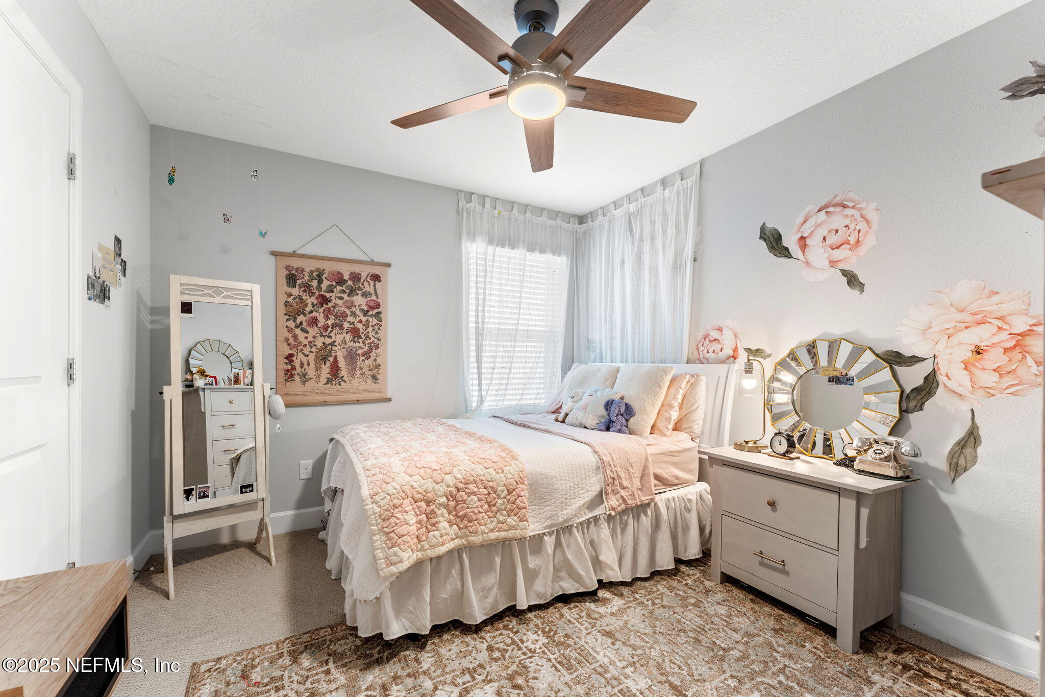 267 Windswept Way St. Augustine, FL 32092 - Photo 27 of 50 a bedroom with a bed and a table in it