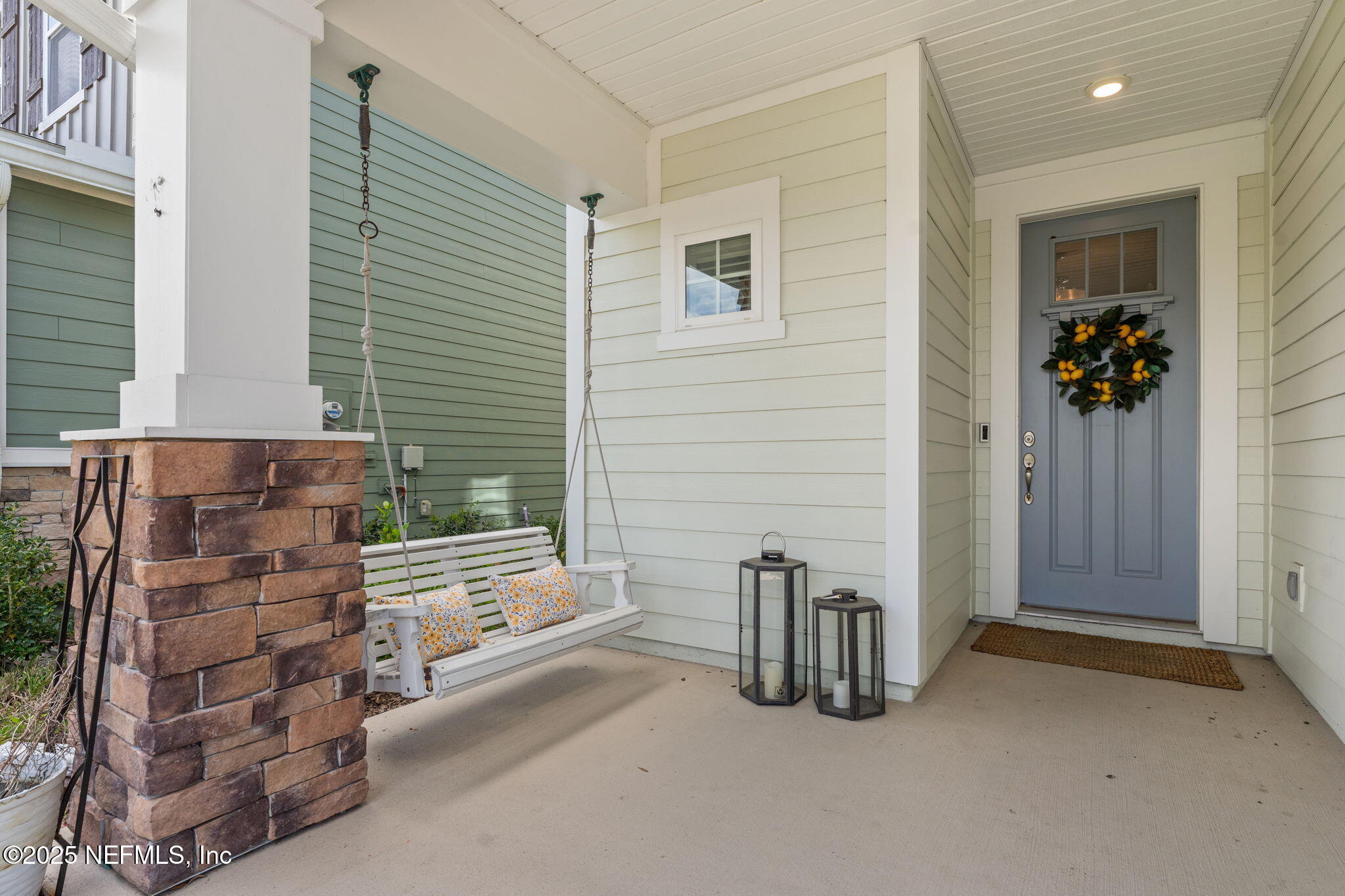 267 Windswept Way St. Augustine, FL 32092 - Photo 3 of 50 a view of an entryway with wooden floor