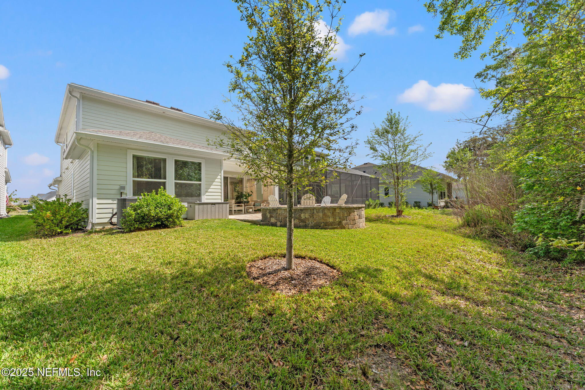 267 Windswept Way St. Augustine, FL 32092 - Photo 35 of 50 a house view with a garden space