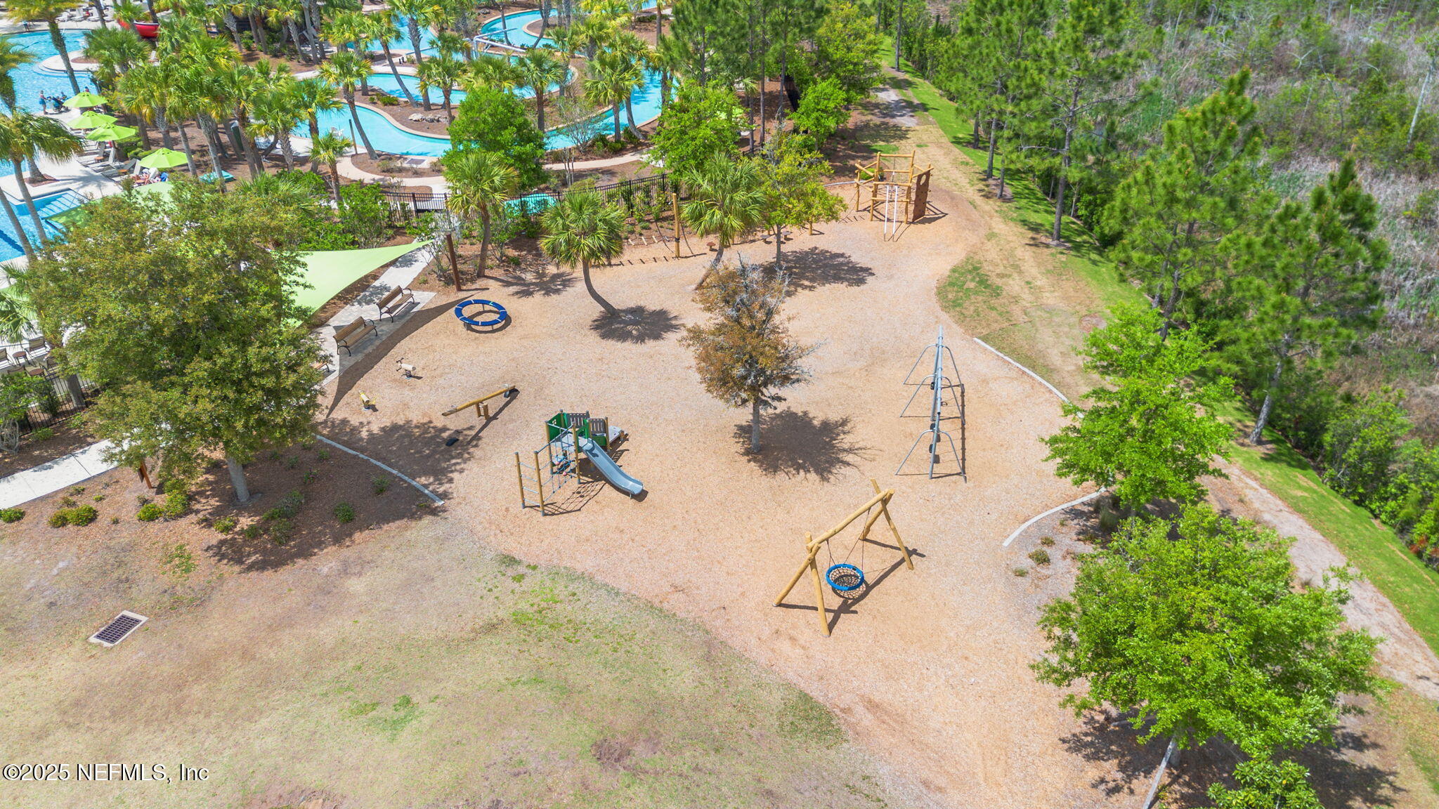 267 Windswept Way St. Augustine, FL 32092 - Photo 50 of 50 a view of a swimming pool with a yard