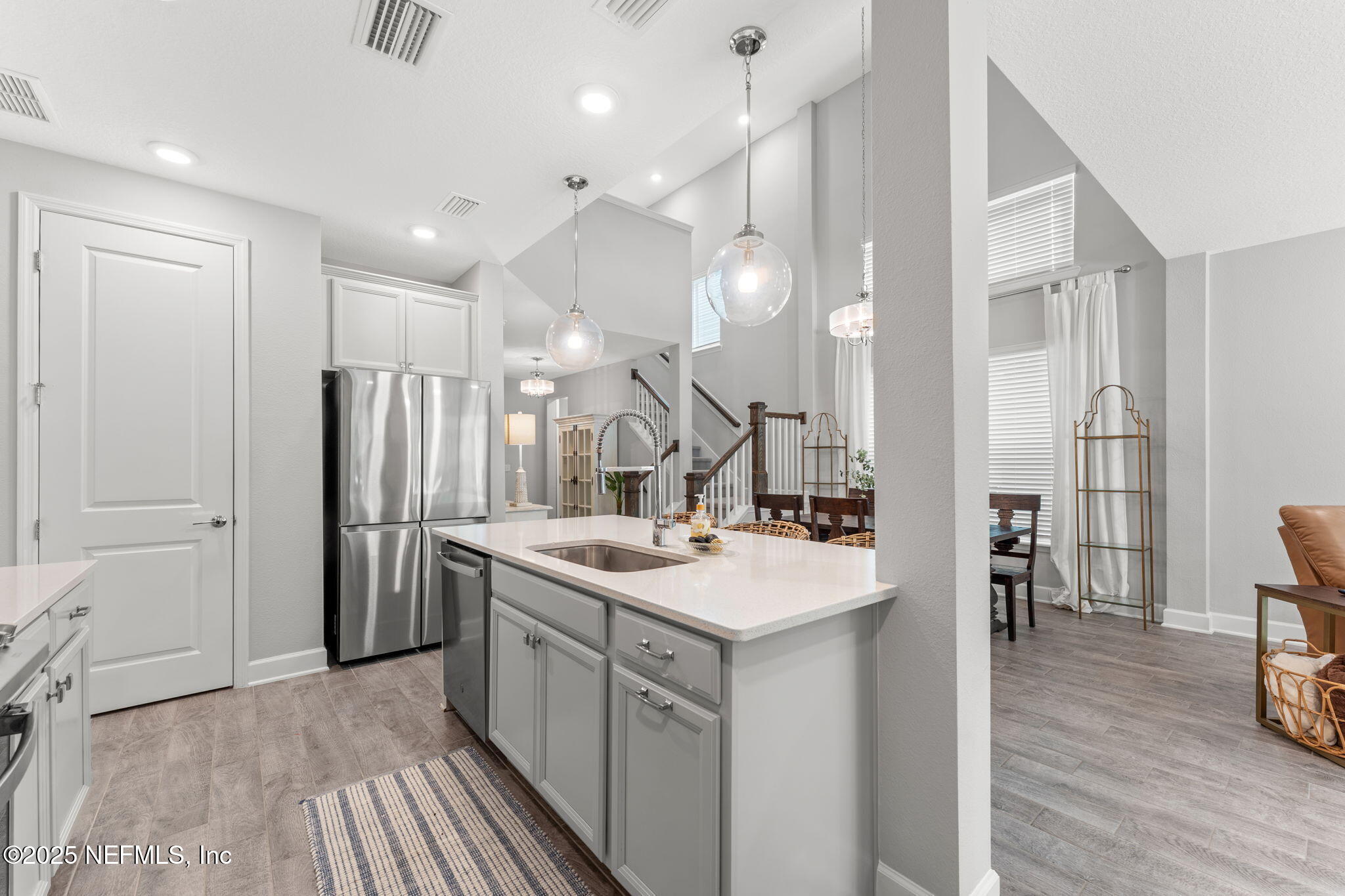 267 Windswept Way St. Augustine, FL 32092 - Photo 8 of 50 a bathroom with a sink a mirror and a shower