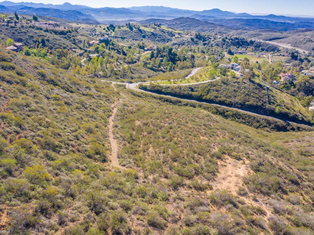 a view of a city with mountains in the background