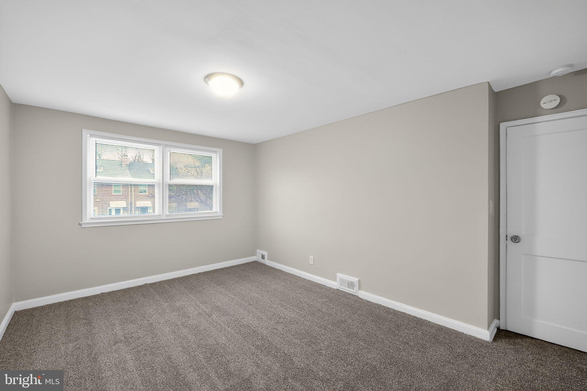 2018 Winford Road Baltimore, MD 21239 - Photo 16 of 29 an empty room with windows