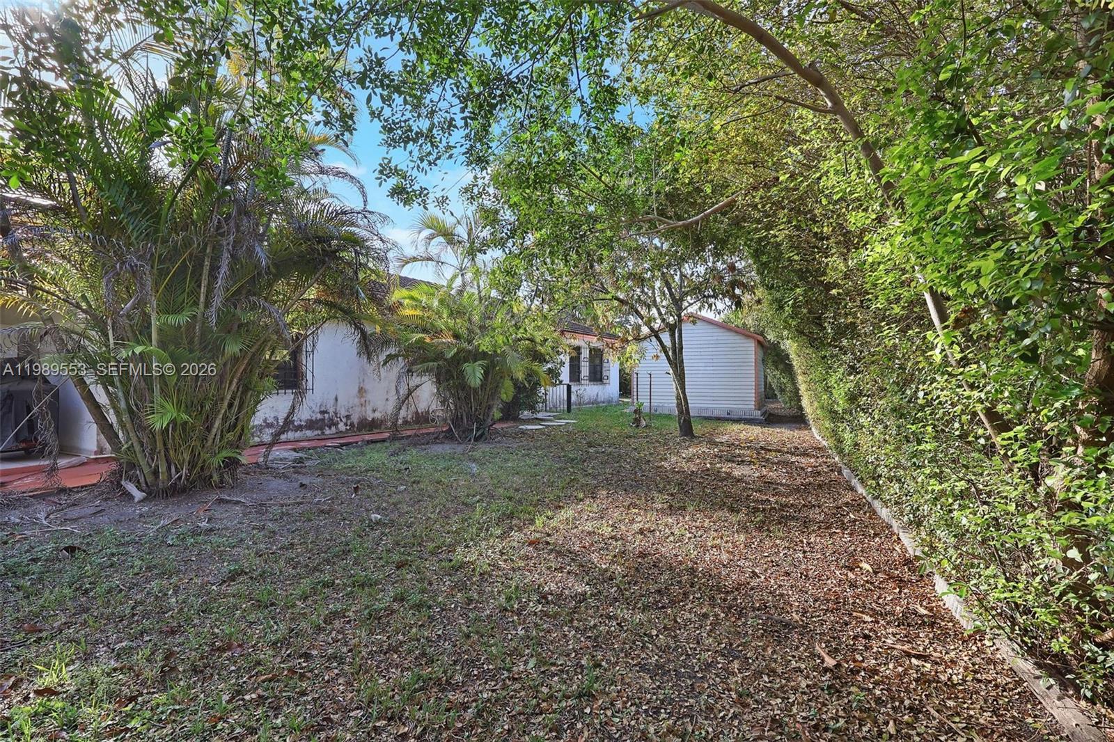 4210 Southwest 134th Avenue Miami, FL 33175 - Photo 25 of 32 a view of a house with a yard