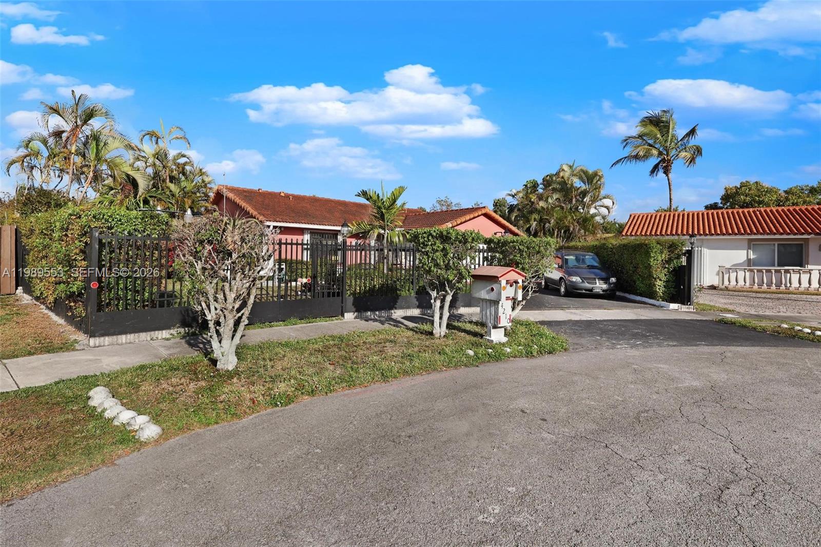 4210 Southwest 134th Avenue Miami, FL 33175 - Photo 28 of 32 a view of a house with a yard and potted plants