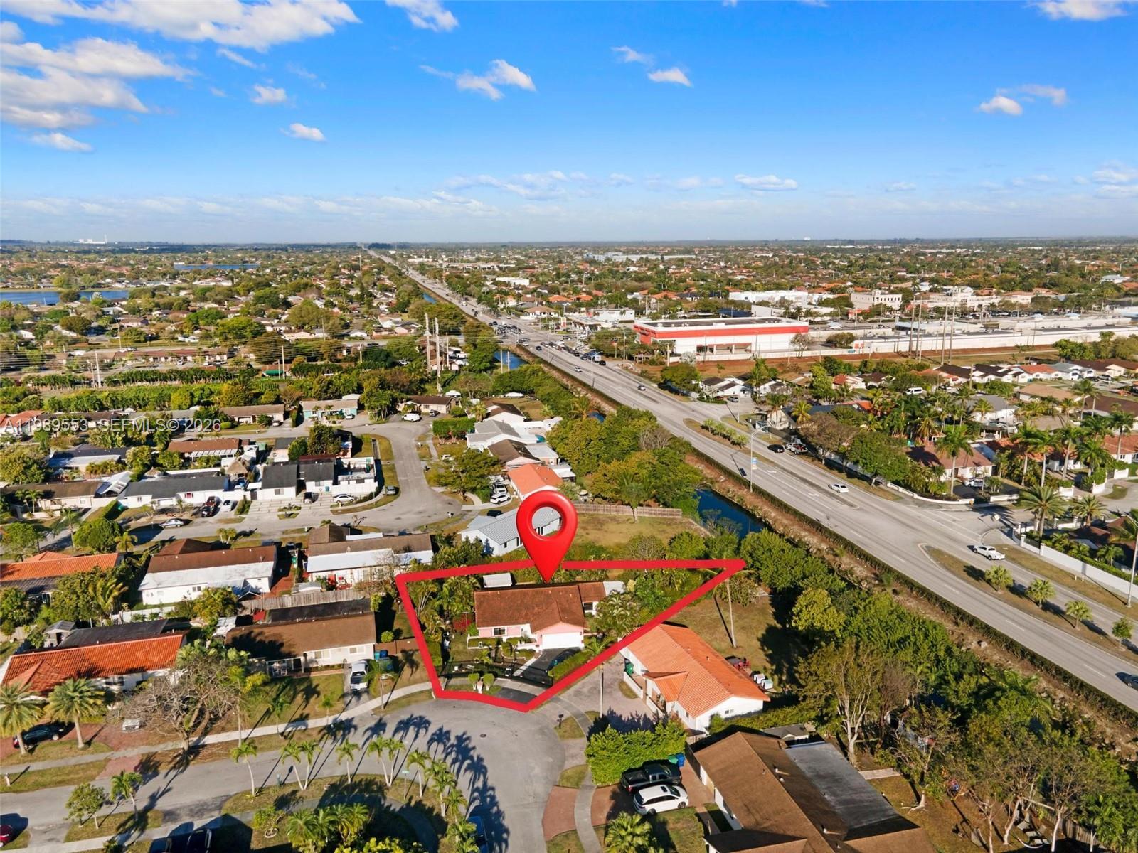 4210 Southwest 134th Avenue Miami, FL 33175 - Photo 3 of 32 an aerial view of residential building and ocean