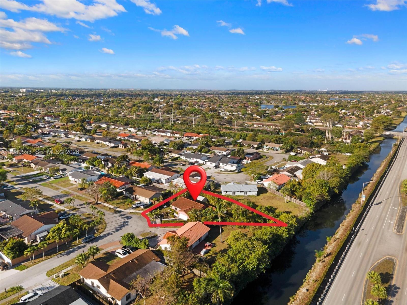 4210 Southwest 134th Avenue Miami, FL 33175 - Photo 4 of 32 an aerial view of residential houses with outdoor space