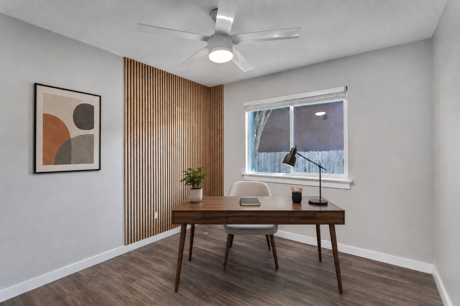 12321 Emery Oaks Road Austin, TX 78758 - Photo 16 of 27 A well-lit study/office/guest bedroom provides a serene workspace. Virtually staged.