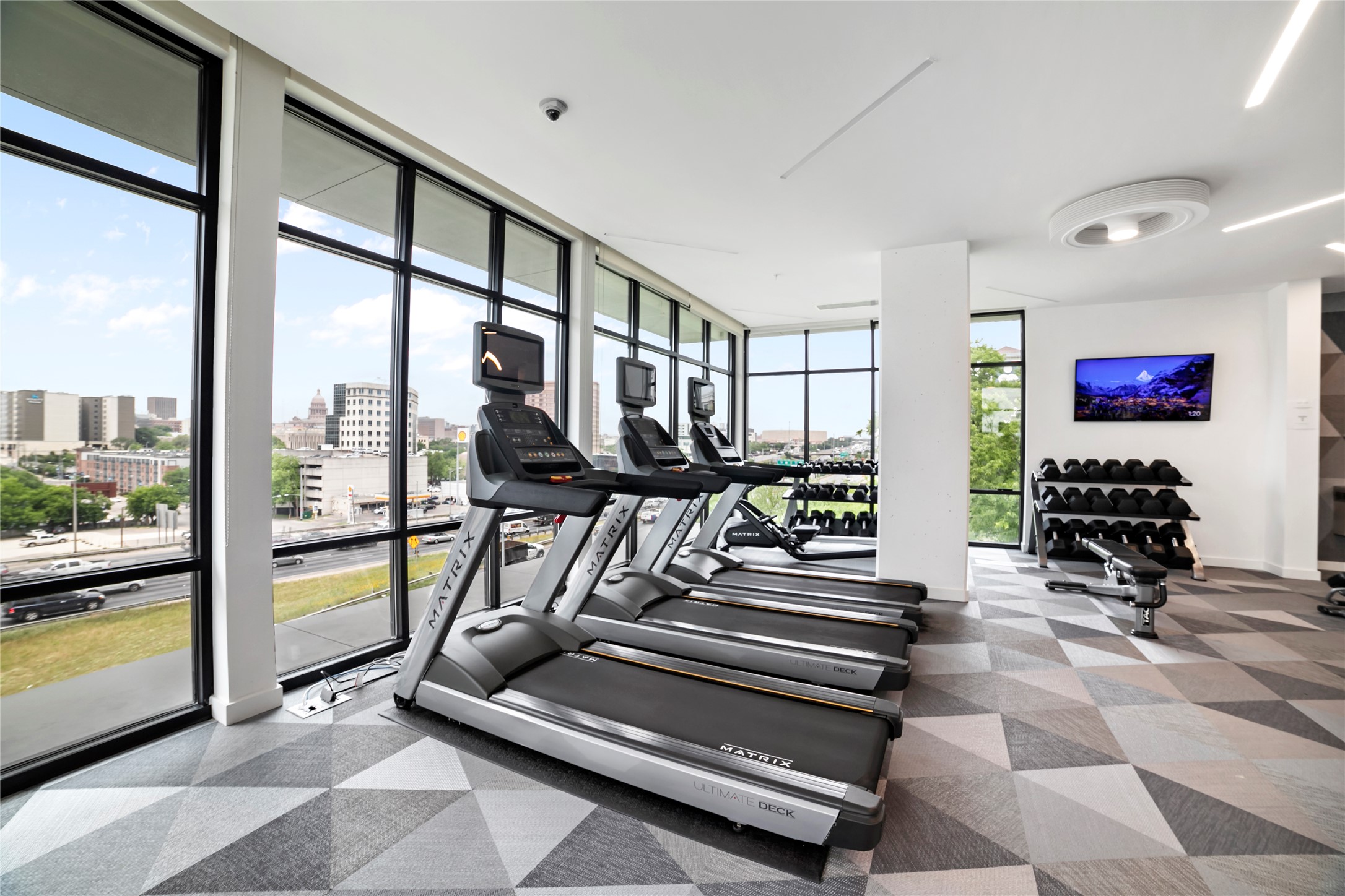 800 Embassy Drive, Unit 123 Austin, TX 78702 - Photo 25 of 39 a view of a room with gym equipment