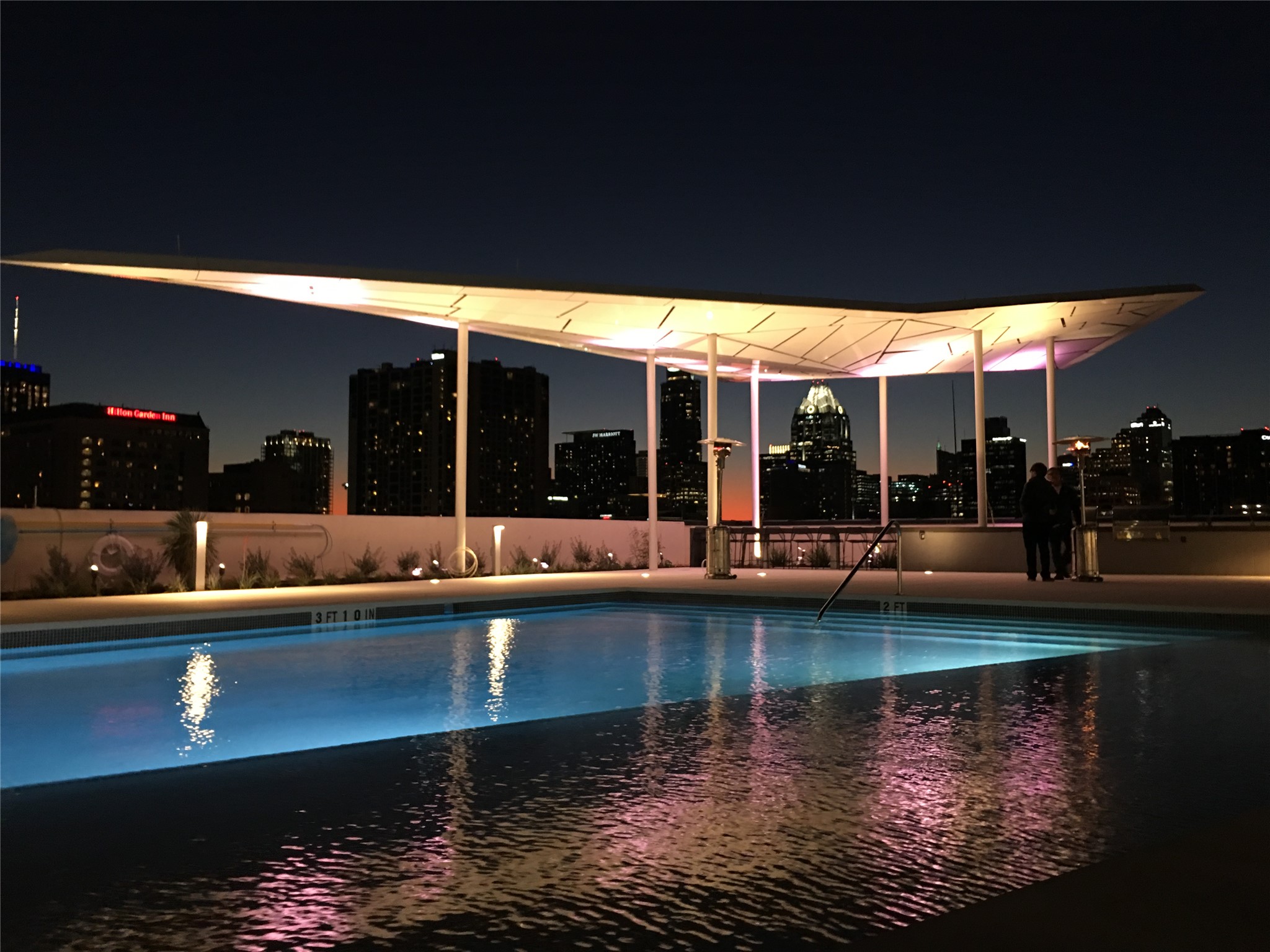 800 Embassy Drive, Unit 123 Austin, TX 78702 - Photo 32 of 39 a view of a swimming pool with a patio