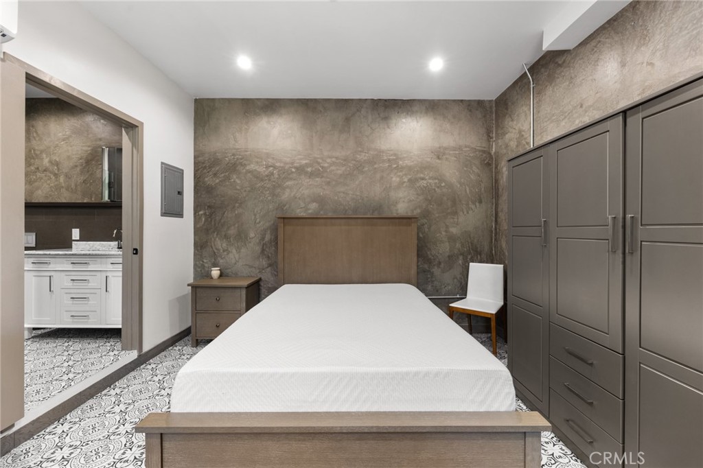 2211-1.2 Hyperion Avenue, Unit 1/2 Los Angeles, CA 90027 - Photo 11 of 15 a large white bed in a white room