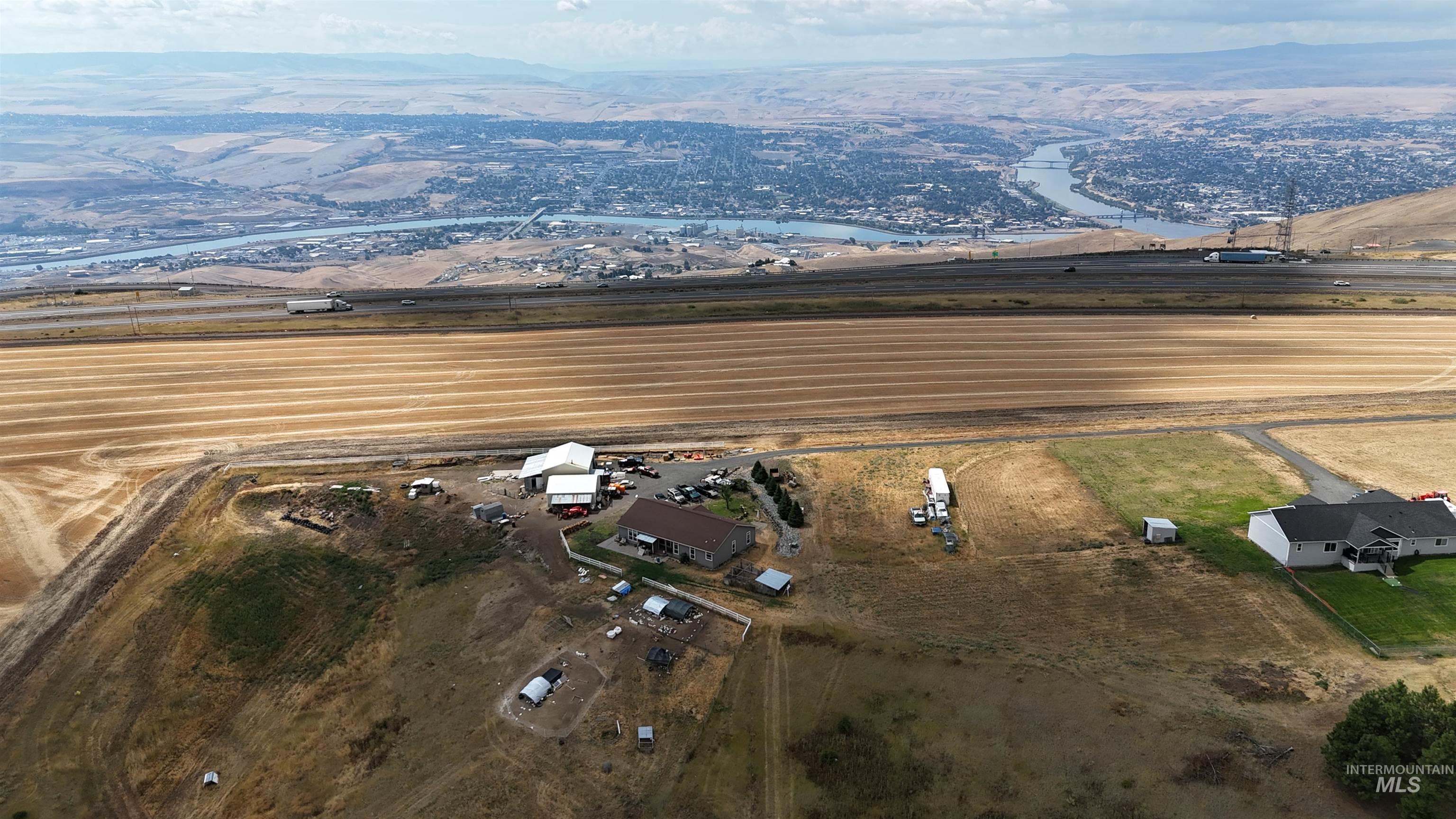 Tbd Spur Road Genesee, ID 83832 - Photo 2 of 8 Aerial view of sparsely populated area with a mountain backdrop