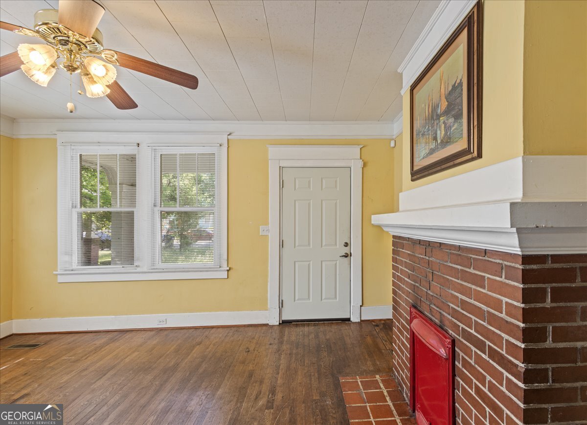 1823 Starnes Street Augusta, GA 30904 - Photo 12 of 34 a view of an empty room with window and wooden floor