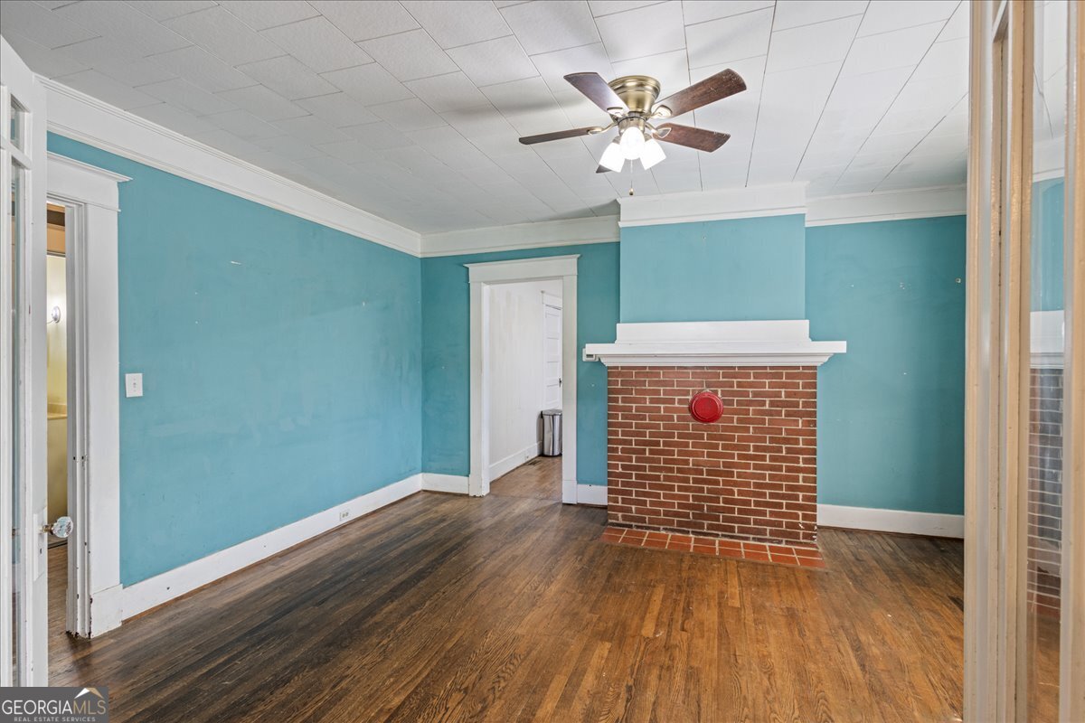 1823 Starnes Street Augusta, GA 30904 - Photo 14 of 34 wooden floor in an empty room with a window