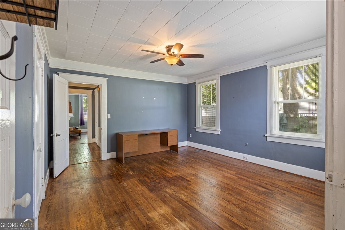 1823 Starnes Street Augusta, GA 30904 - Photo 22 of 34 wooden floor in an empty room with a window