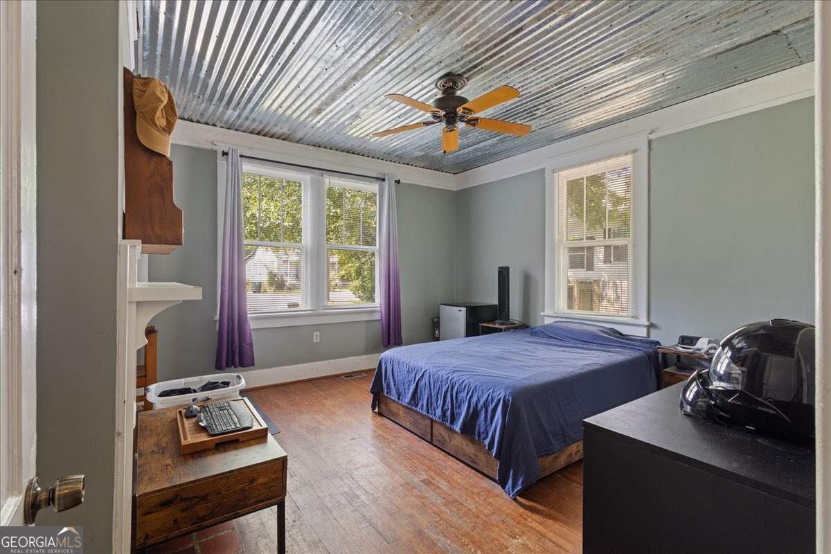 1823 Starnes Street Augusta, GA 30904 - Photo 27 of 34 a bedroom with a bed and a window