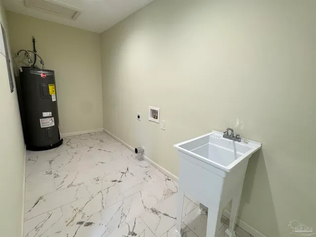 a bathroom with a sink and mirror