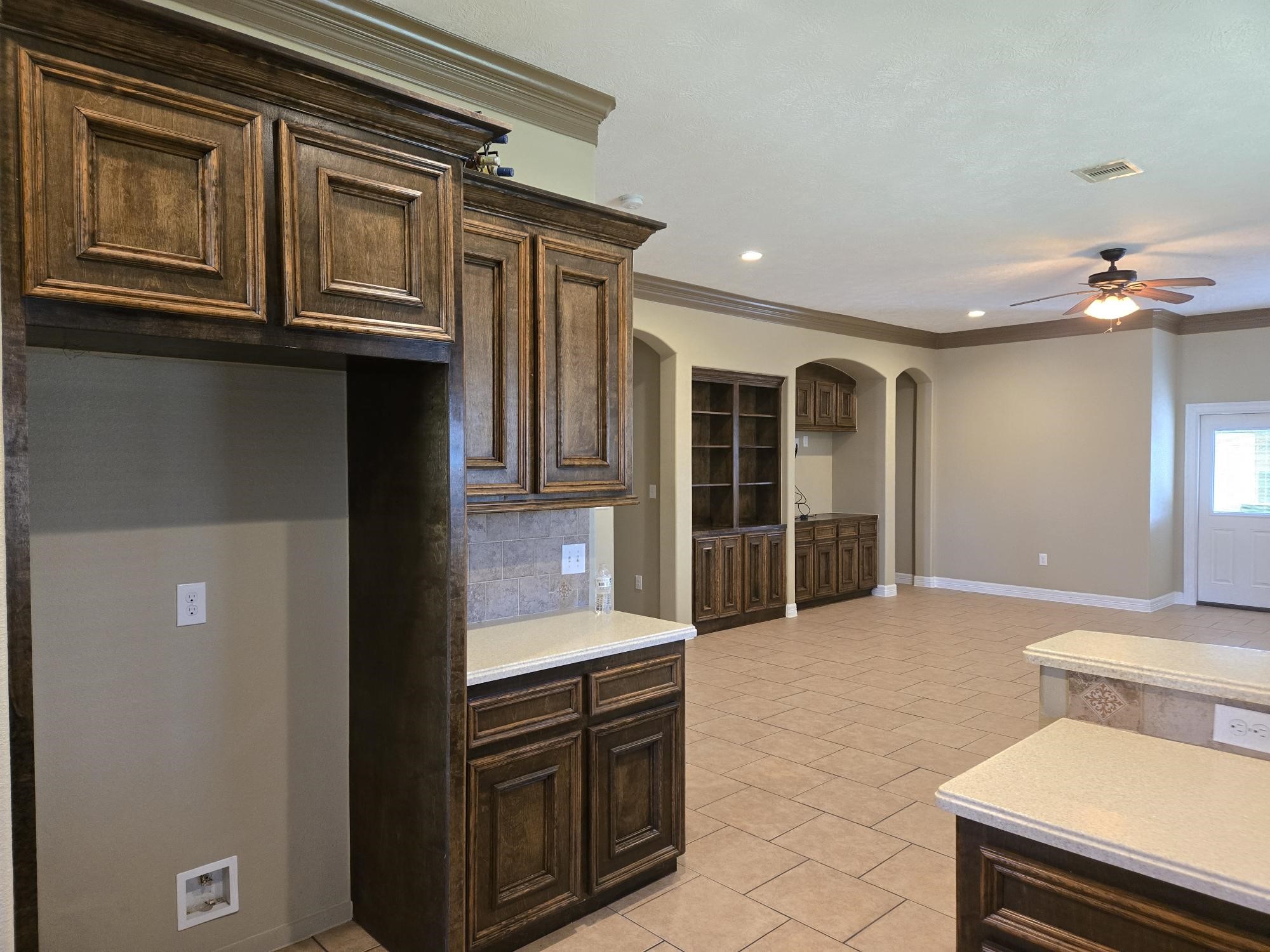 306 Masterson Street Arcola, TX 77583 - Photo 10 of 28 a view of kitchen with stainless steel appliances granite countertop cabinets and window