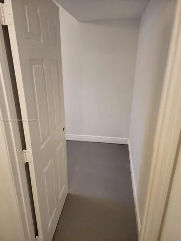 an empty room with a door