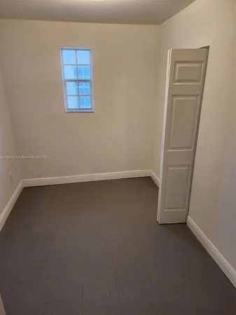 a view of small space with racks on the wall