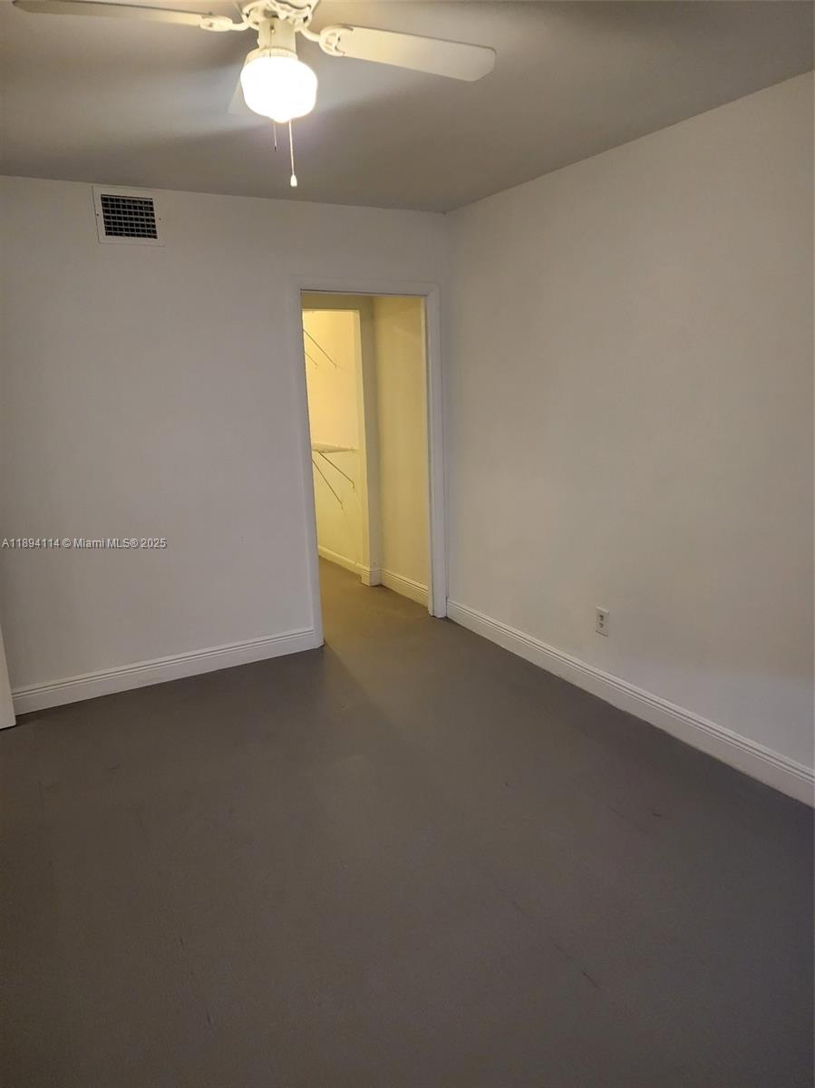 14240 Northwest 22nd Avenue, Unit 3 Opa-Locka, FL 33054 - Photo 21 of 49 a view of an empty room