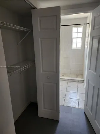 an empty room with a window