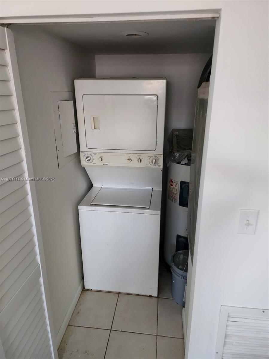 14240 Northwest 22nd Avenue, Unit 3 Opa-Locka, FL 33054 - Photo 45 of 49 a utility room with dryer and washer