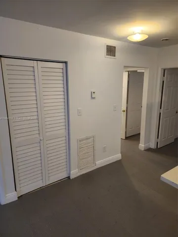 an empty room with closet