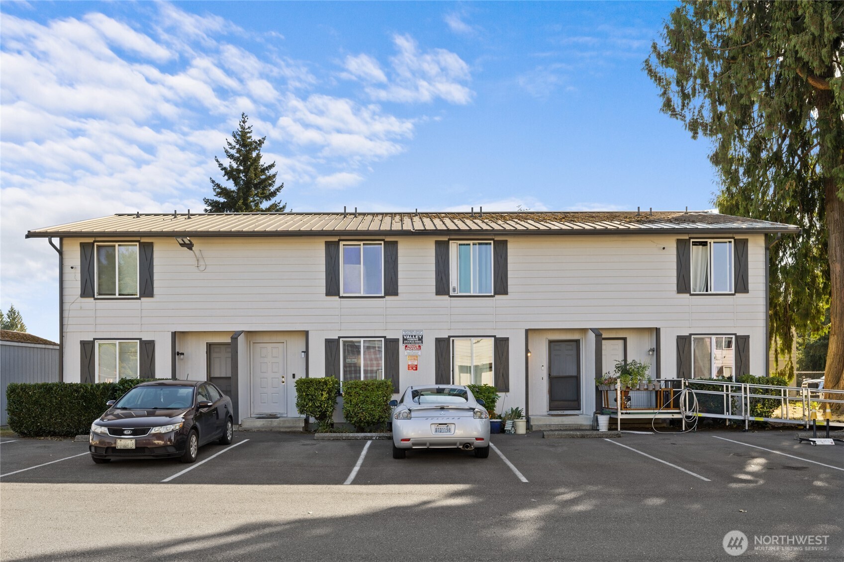 501 37th Street Southeast Auburn, WA 98002 - Photo 1 of 29 a car parked in front of a building
