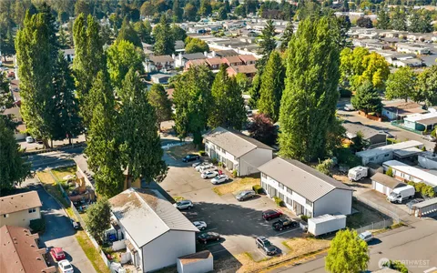 an aerial view of residential house with outdoor space