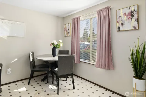 a kitchen with stainless steel appliances a stove a sink and a refrigerator