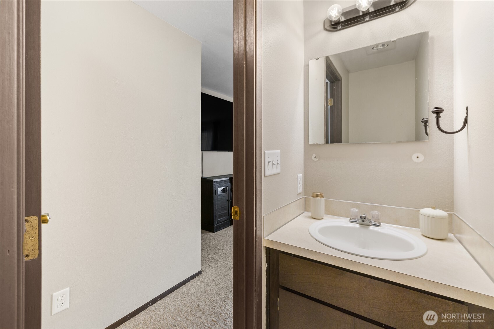 501 37th Street Southeast Auburn, WA 98002 - Photo 22 of 29 a bathroom with a sink and a mirror