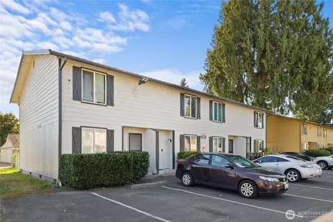 a car parked in front of a house