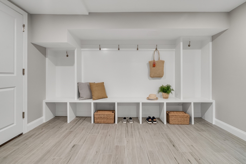 956 Waltham Street Lexington, MA 02421 - Photo 19 of 41 a view of workspace with wooden floor and cabinet